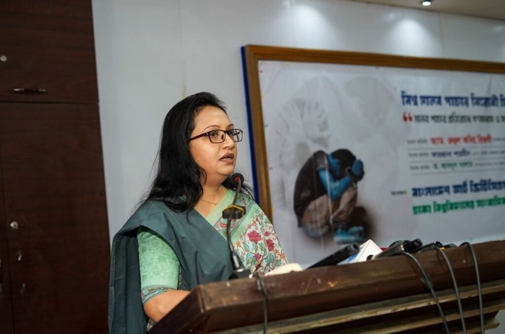 A speaker at the podium during the national seminar