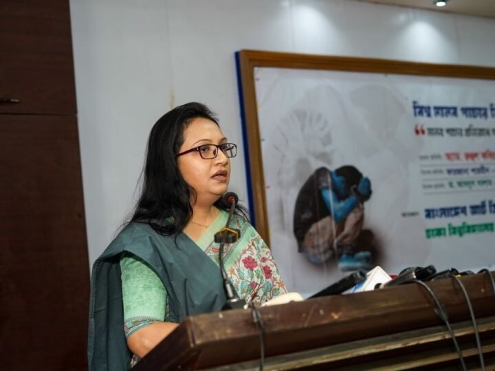 A speaker at the podium during the national seminar