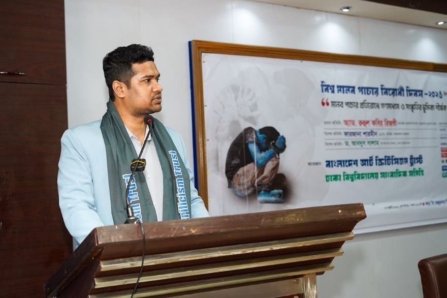 A speaker addresses the national seminar